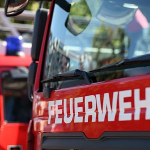 Dettaglio di un'autopompa dei Vigili del Fuoco tedeschi con in primo piano la scritta “Feuerwehr”